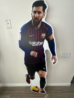 Life size cardboard Ronaldo and Messi.