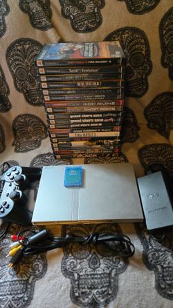 Ps2 slim console with 18 amazing games