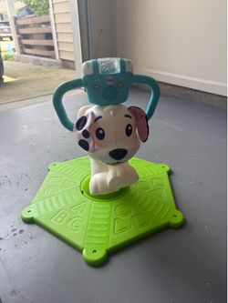 Fisher-Price Laugh & Learn Bounce & Spin Puppy – Musical Ride-On Toy