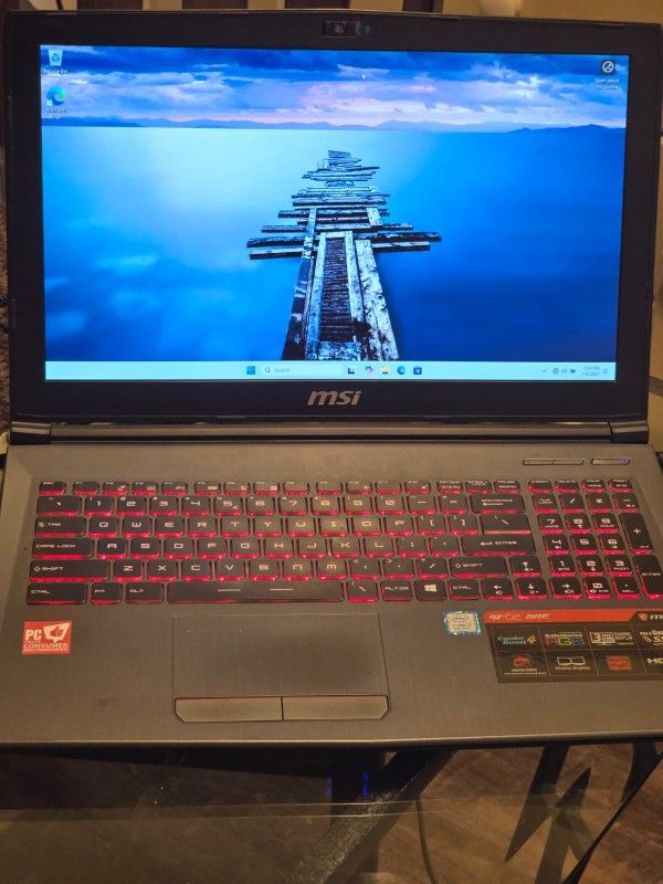 Gaming Laptop MSI GF62 8RE 15.6" 256 GB SSD + 1 TB HDD 16 GB RAM i7-8750H GTX 1060 6Gb Vram Open To Trades
