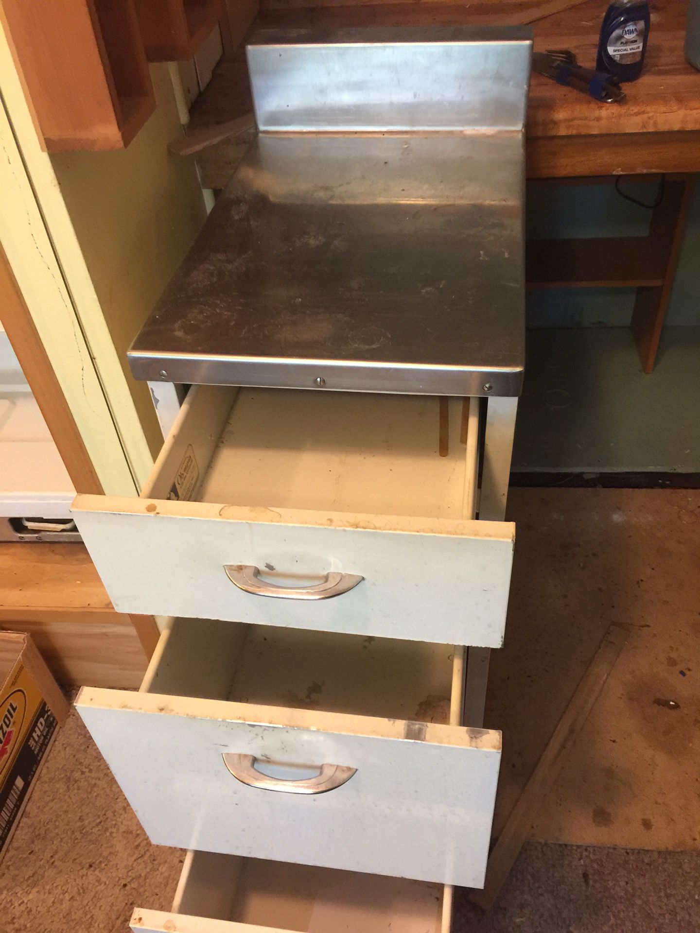 All metal kitchen cabinet. 3 drawer. Free. Needs to be cleaned. Pending pickup