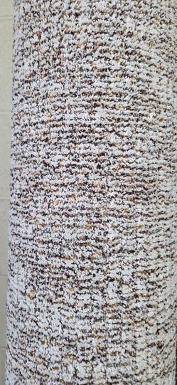 White with multi colored carpet Remnant