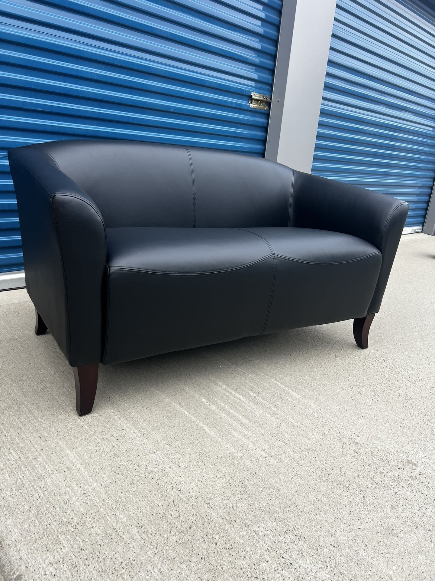 Brand New. LeatherSoft Loveseat Sofa. $399