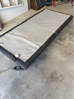 Twin size electric adjustable bed frame.