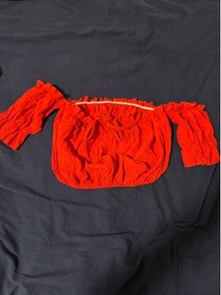 Red off shoulders  shirt (s)