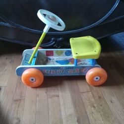 Fisher Price Antique Scooter Toy. 