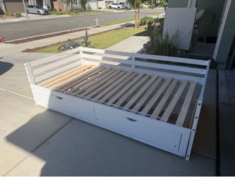 Bed frame with two drawer turns into a queen bed