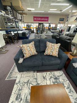 Beautiful, two-piece sofa and loveseat and blue