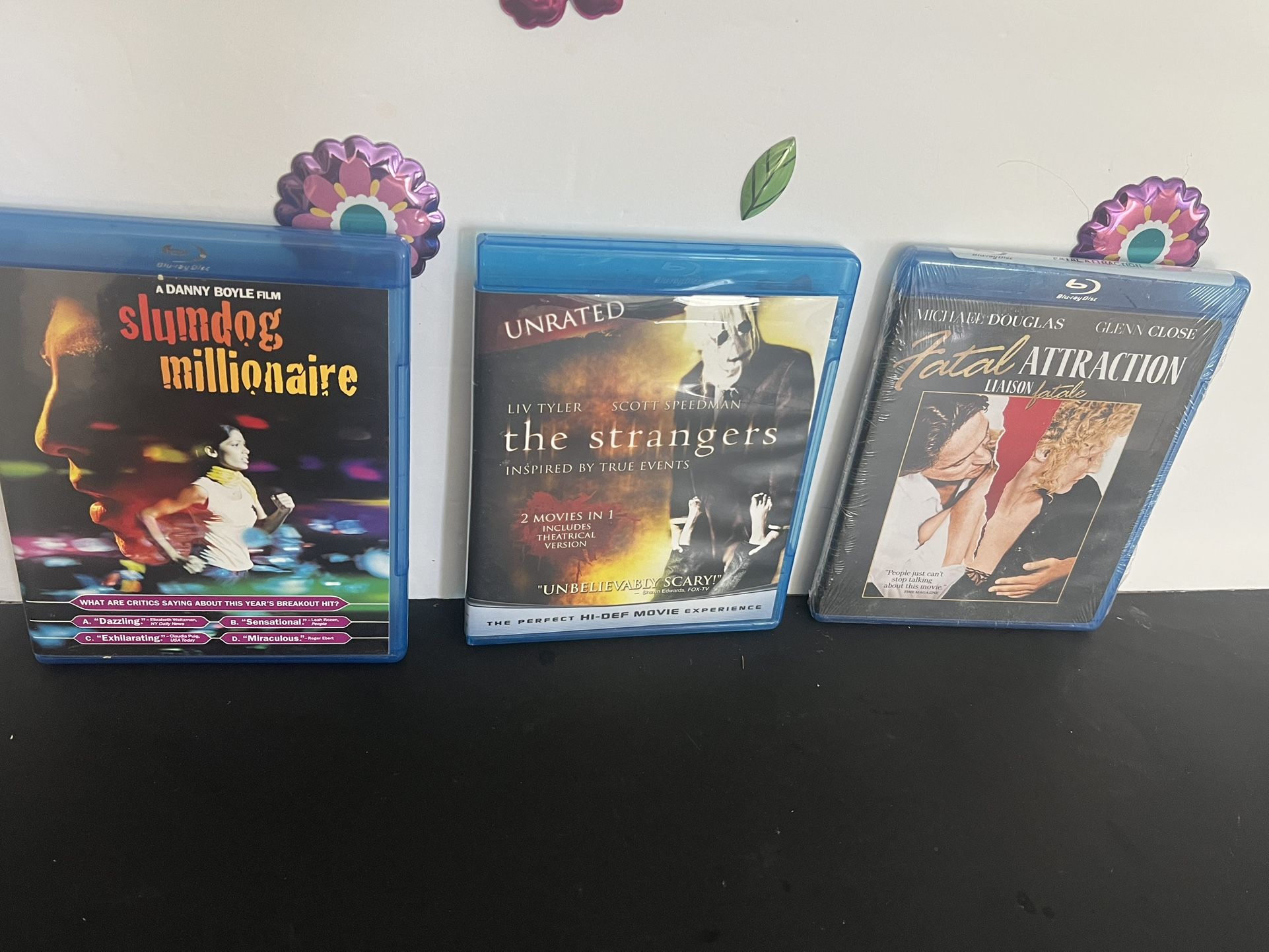 BLU RAY DVS’s NEW SEALED - LOT OF 3 , SLUMDOG MILLIONAIRE, FATAL ATTRACTION & THE STRANGERS. $5 each