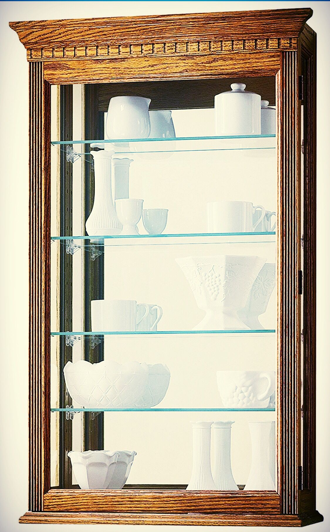 Howard Miller oak Collectors cabinet