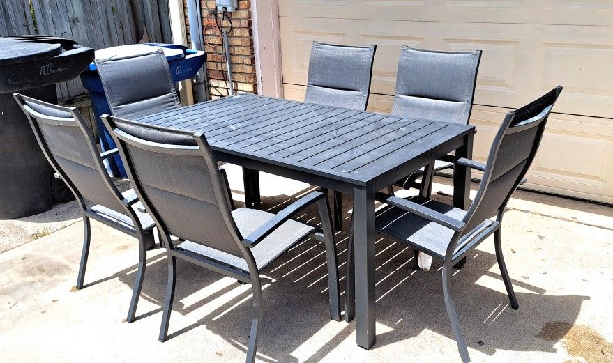 set de patio de jardin 6 sillas en buenas condiciones color gris