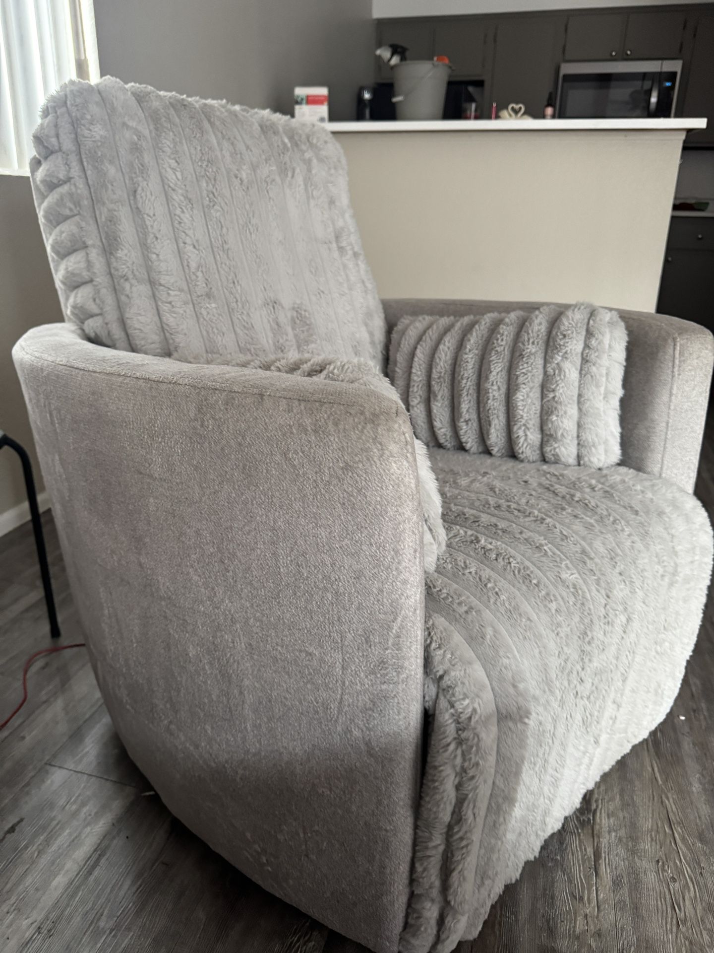 Grey recliner chair