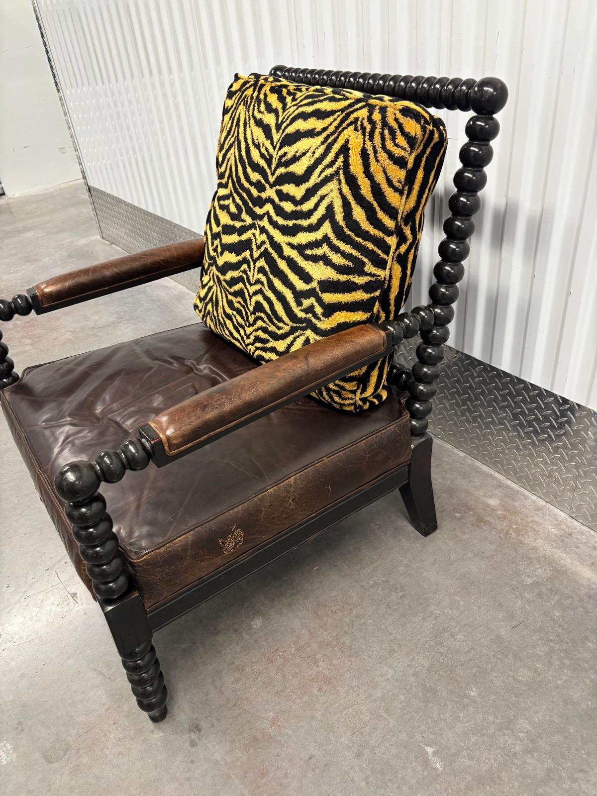 Chair fit for a king! Tommy Bahama XL large solid wood chair ….with tiger cushion & leather seat …very comfortable…,