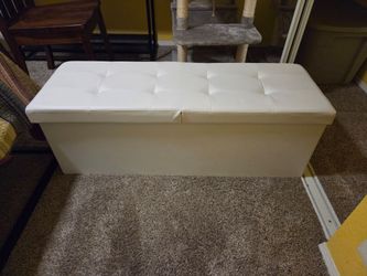 Padded white storage bench