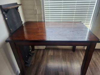 Tall-ish brown table with leaf  $20