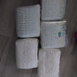 5 PACKS THE  PAMPERS 2 N 1 SIZE 1 AND 2 SIZE 2 $20 FOR ALL 