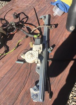 Window motor whit the harnes for a 2007,8,9, GMC cierra 1500