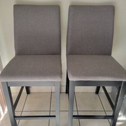 2 High Dinning Chairs 
