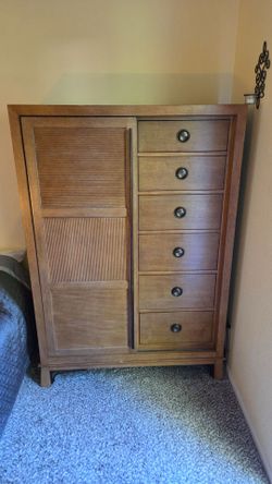 Solid wood chest of drawers.