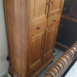 wooden bar cabinet or armoire