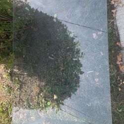 Glass living room table 2&half feet by 4 feet