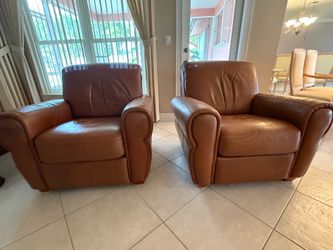 2 Leather Arm Chairs