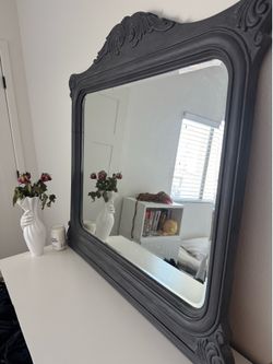 Large ornate slate gray mirror