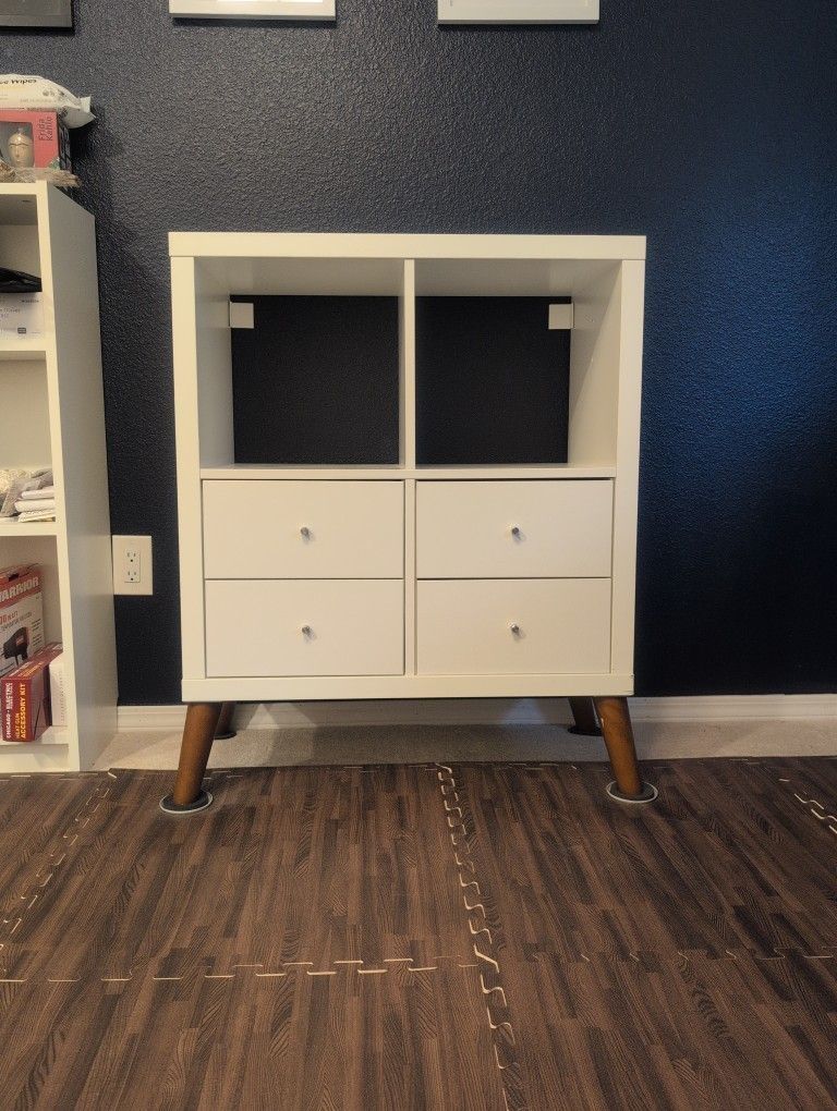 IKEA KALLAX shelf unit + four white drawer inserts + wooden legs