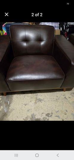 Brown leather  loveset  couch and matching chair