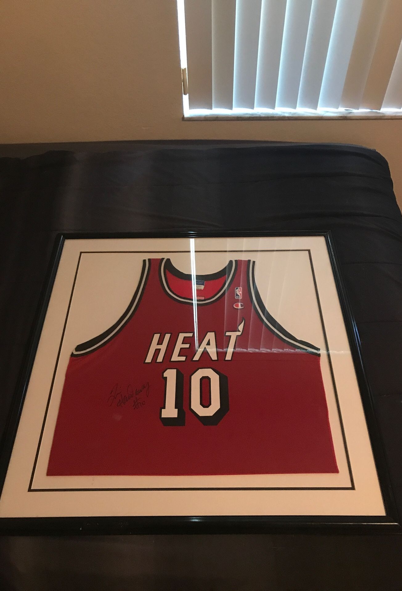 Autographed “Tim Hardaway” Heat Jersey