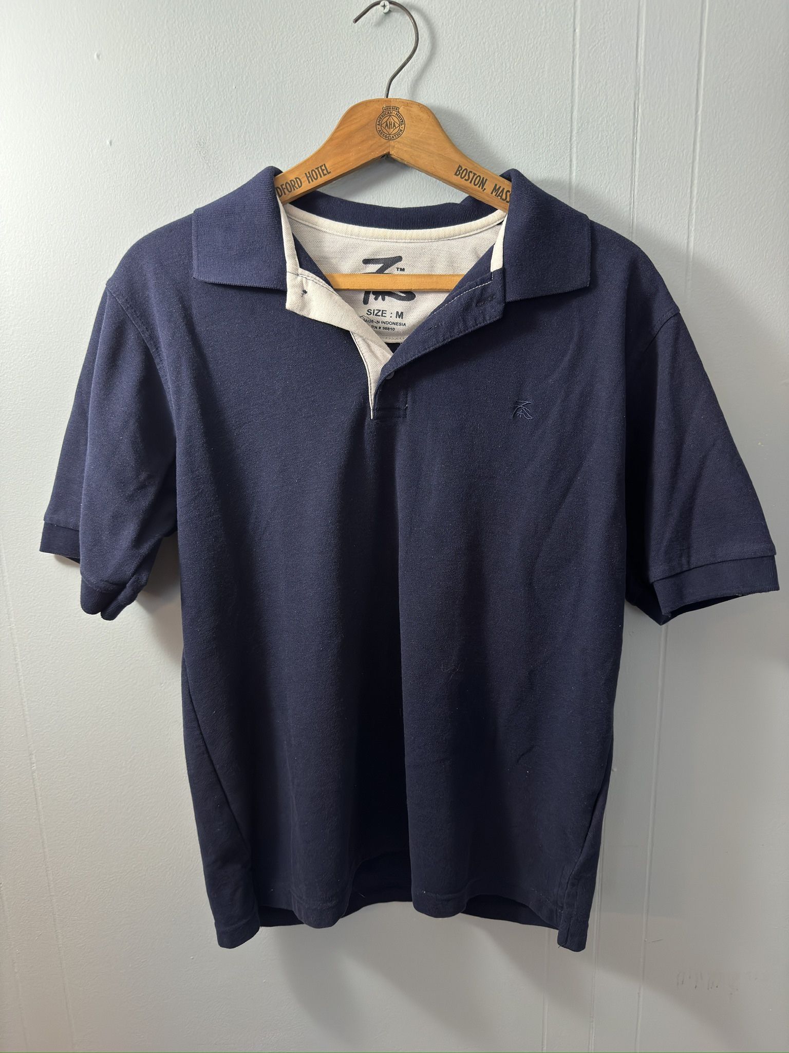 Polo Shirt, Size Medium. 