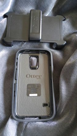 Samsung S5 Otter Box and clip.
