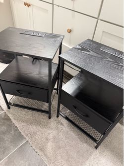 Two electric outlet side tables