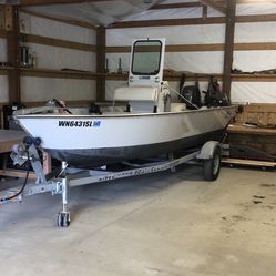 2018 River Hawke 16’ Center console with floor.