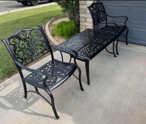 Patio set. All metal. Chairs. Coffee table. Nice condition.