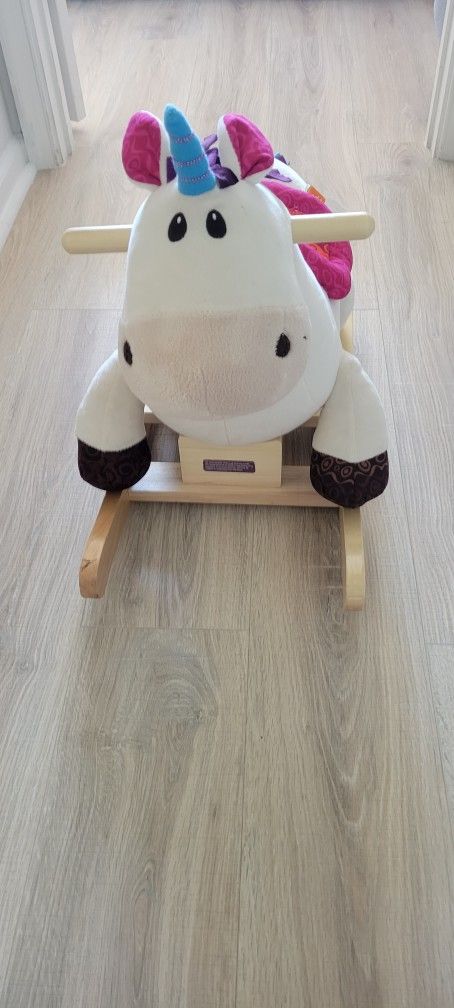 New Box Pampers and Used Baby Rocking Horse