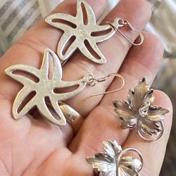 Two Pair Of Sterling Silver Earrings; One Is Vintage Star Shape And The Other Is Leave Shape Shining With A White Cz