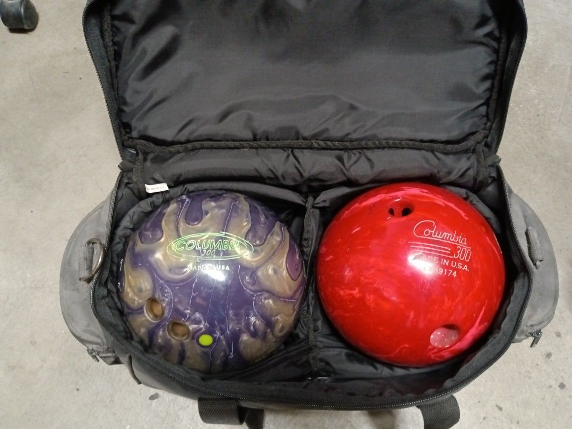 Two Bowling Balls With Bag