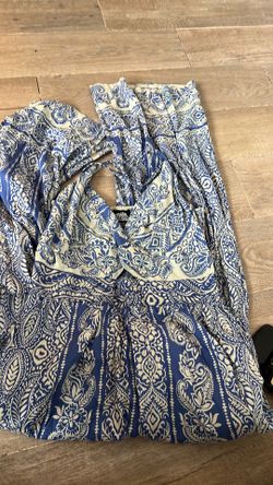 New blue jump suite with pockets $15