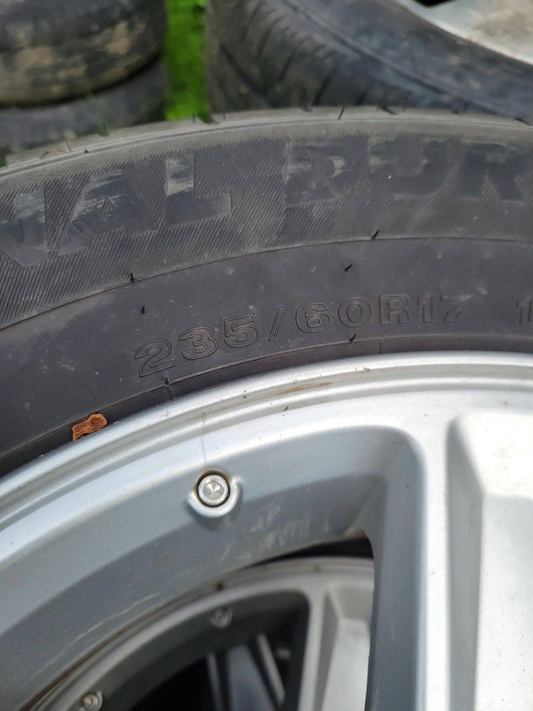 (4) 235 60 R17 tires and aluminum wheels