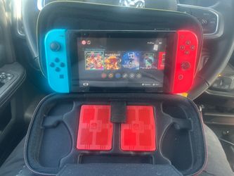 Nintendo switch with Mario kart and more
