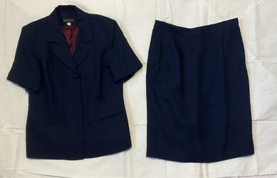 2 piece , navy blue women’s skirt suit