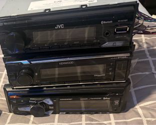 Single din car stereos with Bluetooth and harness $50 each