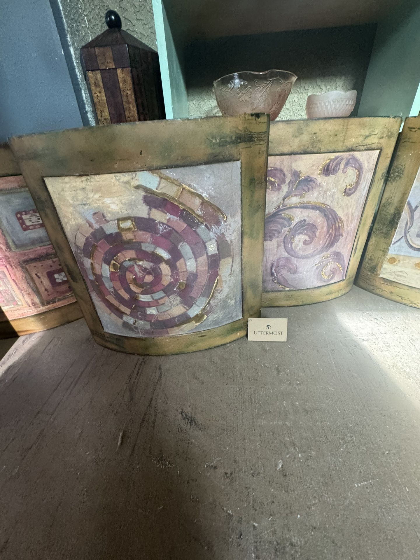 6- Beautiful decorative wall art featuring a rustic, abstract design All For $65