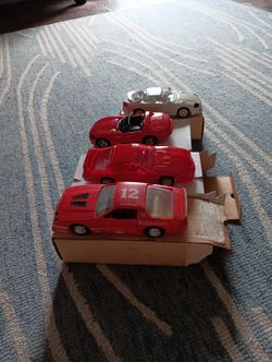 4 plastic Model Cars