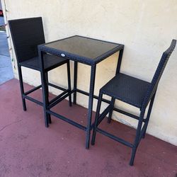 HAVE A NEW OUTSUNNY 3 PIECE RATTAN BAR SET WITH GLASS TOP BOUGHT NEW FOR 125 PLUS TAX AND SHIPPING ITS A LITTLE TO SMALL FOR MY AREA MY LOSS YOUR GAIN