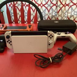 Nintendo Switch OLED Bundle. A lot Here. Please Read