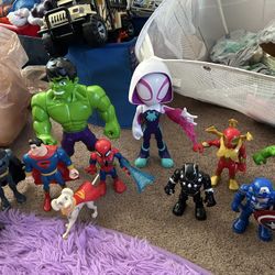 Used Superhero Figures And Disney Barbie Dolls 