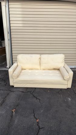 IKEA mini white leather couch