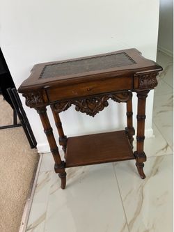 2 brown small tables